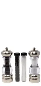 Salt and pepper shakers stand next to two small cylindrical containers filled with pepper and salt. The shakers have clear glass bodies and metallic tops, while the containers have black caps.