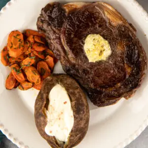 Rib eye steak, baked potato with sour cream with Olde Thompson Himalayan Pink Salt Grinder, Course Ground, 10 oz