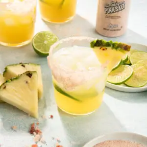 PINEAPPLE MARGARITA WITH HIMALAYAN SALT RIM